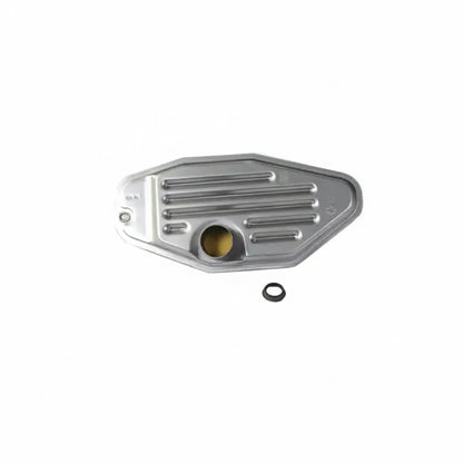 Metallic engine cover with a gasket on a white background