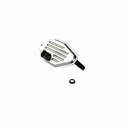 Metallic spatula with a small black object on a white background