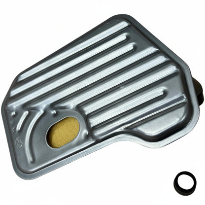 Metallic filter with a cork and an o-ring on a white background