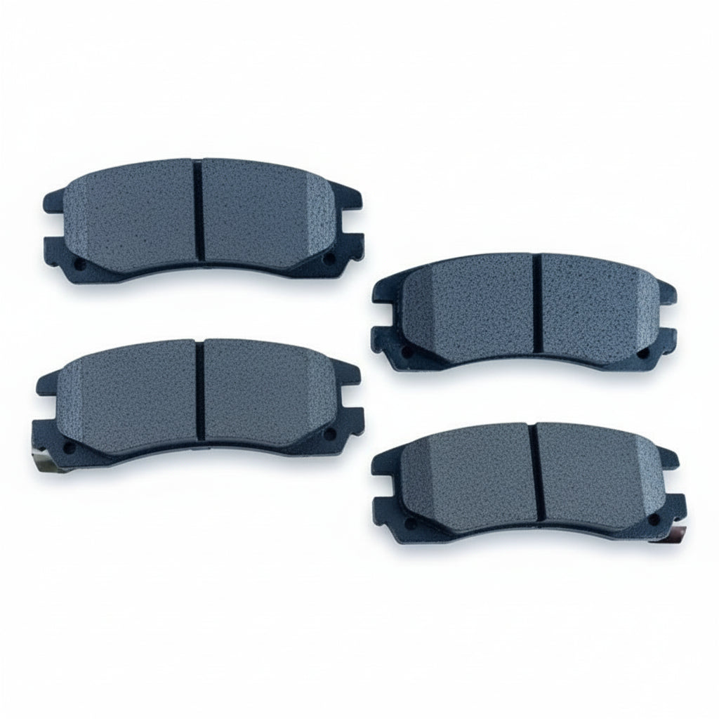 Four ACDelco brake pads on a white background with ACDelco branding.