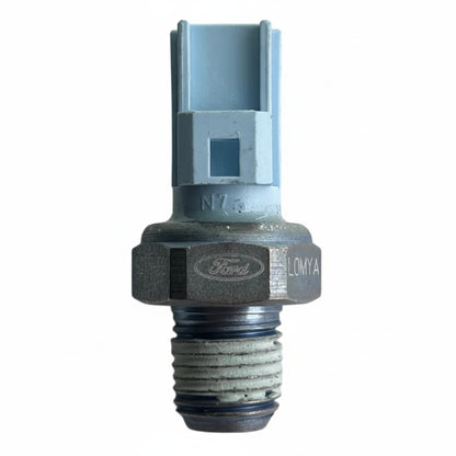 Ford engine part on a white background