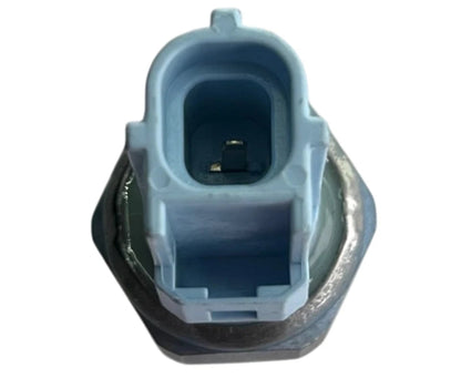 Close-up of a mechanical component with blue and black colors on a white background